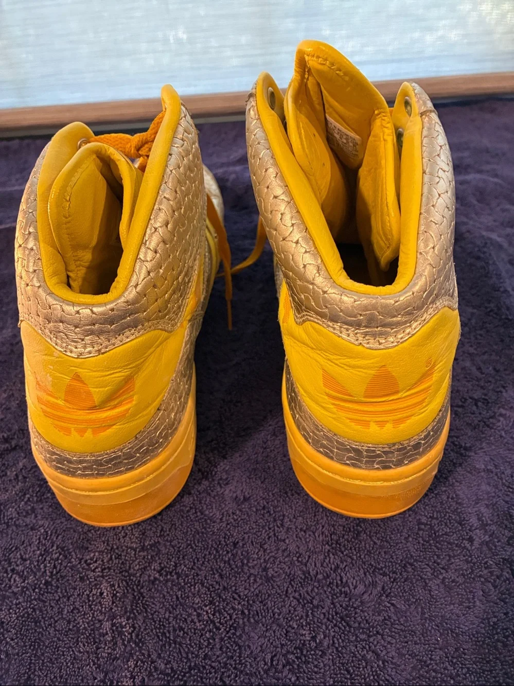adidas Jeremy Scott Yellow and Metallic Gold High-Top Sneakers